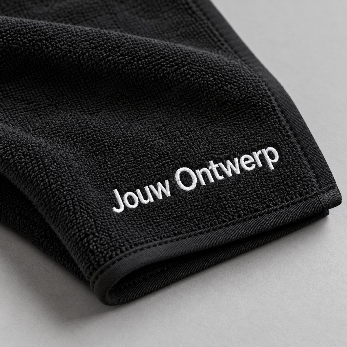 Gepersonaliseerde sporthanddoek met eigen logo